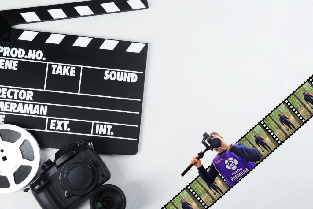 Filmiklapp, fotokaamera, filmirull ja filmilint videograafiga valgel laual